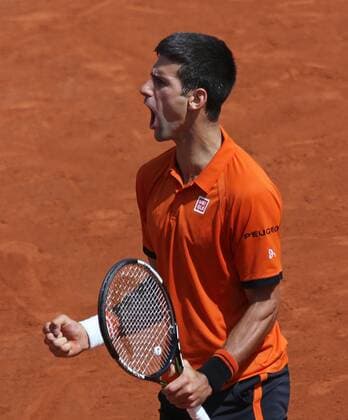 Novak Djokovic of Serbia reacts after a shot during his French Open men s final match against Stan Wawrinka of Switzerland at Roland Garros in Paris on June 7, 2015.  PAR20150607707 DAVIDxSILPA