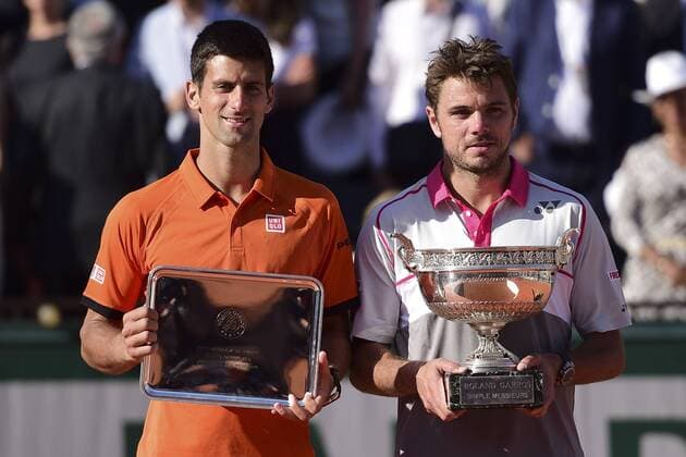 Novak Djokovic (srb) et Stanislas Wawrinka (sui) posant sur le podium TENNIS : Roland Garros 2015 - Finale Homme - Internationaux de France - 07 06 2015 