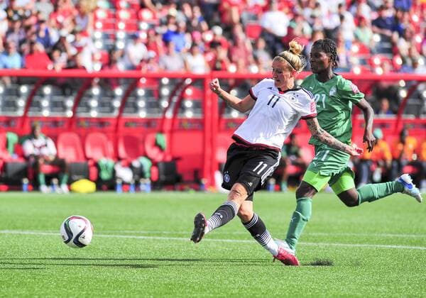 June 07, 2015: Forward Anja Mittag ( 11) of Germany Nationalteam shoots and scores during the FIFA 2015 Women s World Cup Group B match between Germany Nationalteam and Elfenbeinküste at Lansdowne Park in Ottawa, Canada. SOCCER: JUN 07 FIFA Women s World Cup - Group B - Germany Nationalteam v Ivory Coast Icon15060700009 EDITORIAL USE ONLY