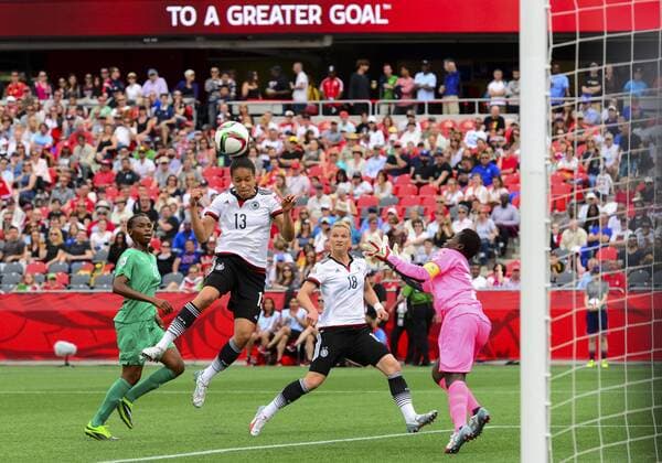 June 07, 2015: Midfielder Celia Sasic ( 13) of Germany Nationalteam heads in the second goal for Germany Nationalteam in the first half during the FIFA 2015 Women s World Cup Group B match between Germany Nationalteam and Ivory Coast at Lansdowne Park in Ottawa, Canada. SOCCER: JUN 07 FIFA Women s World Cup - Group B - Germany Nationalteam v Ivory Coast Icon150607001 EDITORIAL USE ONLY