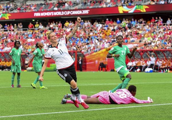 June 07, 2015: Forward Anja Mittag ( 11) of Germany Nationalteam celebrates after scoring in the first half during the FIFA 2015 Women s World Cup Group B match between Germany Nationalteam and Ivory Coast at Lansdowne Park in Ottawa, Canada. SOCCER: JUN 07 FIFA Women s World Cup - Group B - Germany Nationalteam v Ivory Coast Icon150607002 EDITORIAL USE ONLY