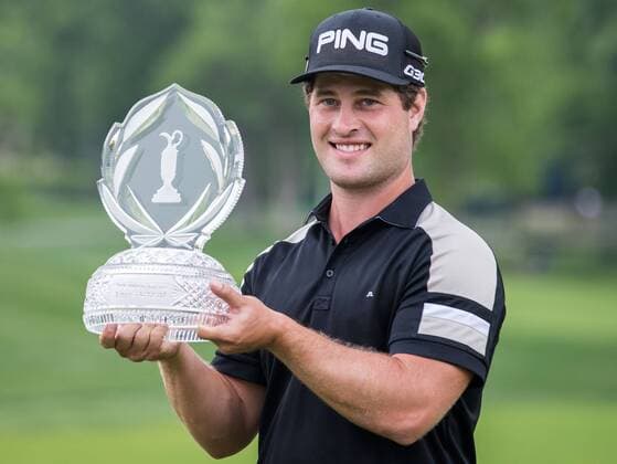 David Lingmerth poses with trophy after winning the Memorial Tournament at Muirfield Village Golf Club in Columbus, Ohio, the United States, on June 7, 2015. David Lingmerth of Sweden wins over Justin Rose in three playoffs. ) (SP)US-GOLF-MEMORIAL TOURNAMENT TingxShen 