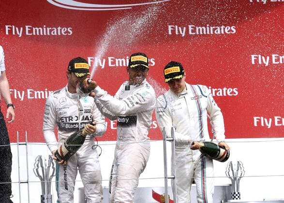 HAMILTON Lewis F1 Team Mercedes AMG bei der Siegeehrung mit ROSBERG Nico und BOTTAS Valteri FIA Grosser Preis von Kanada 2015 in Montreal am 07. Juni 2015 in Montreal 