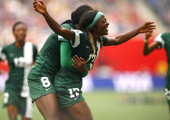 Aktuell Fußball, Damen, WM, Schweden - Nigeria Francisca Ordega (R) of Nigeria celebrate scoring during a group D match between Sweden and Nigeria at the 2015 FIFA Women s World Cup in Winnipeg, Canada, June 8, 2015. The match ended with a 3-3 draw. ) (SP)CANADA-WINNIPEG-FIFA WOMEN S WORLD CUP-GROUP D-SWE VS NGA DingxXu 