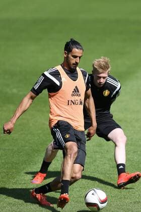 - BRUSSELS, BELGIUM: Belgium s Nacer Chadli and Belgium s Kevin De Bruyne fight for the ball during a training session of the Belgian national soccer team The Red Devils in Brussels, Tuesday 09 June 2015. The Devils are preparing for a Euro 2016 qualification game against Wales. BRUNOxFAHY  x04639613x