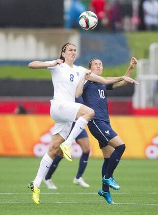 (150609) -- MONCTON, June 9, 2015 -- Jill Scott(L) of England vies with Camille Abily of France during their group F match at the 2015 FIFA Women s World Cup in Moncton, Canada, June 9, 2015. France won 1-0. ) (SP)CANADA-MONCTON-FIFA WOMEN S WORLD CUP-GROUP F-FRANCE VS ENGLAND ZouxZheng 