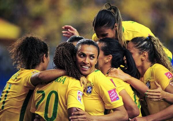 June 9, 2015 - Ottawa, Ontario, Canada - June 09, 2015: Midfielder Formiga ( 20) of Brazil is congratulated by team mates after scoring the opening goal for Brazil during the FIFA 2015 Women s World Cup group match between Brazil and Korea at the Olympic Stadium in Montreal, Canada. Soccer: FIFA 2015 Women s World Cup Group Match - Brazil versus Korea. - ZUMAk120
