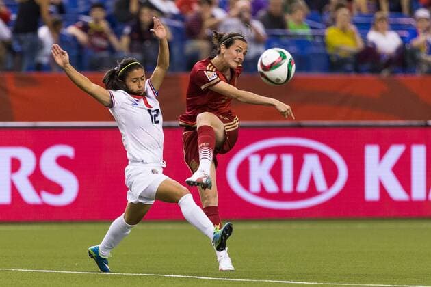 June 09, 2015 : Spain forward Natalia Pablos 7 kicks the ball while Costa Rica defender Lixy Rodriguez 12 defends during the 2015 FIFA Women s World Cup Group E match between Spain and Costa Rica at the Olympic Stadium in Montreal, Quebec, Canada. SOCCER: JUN 09 FIFA Women s World Cup - Group E - Spain v Costa Rica Icon15060915 EDITORIAL USE ONLY