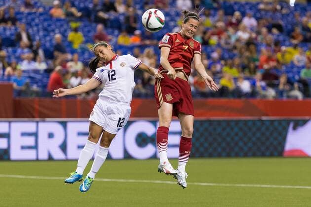 June 09, 2015 : Costa Rica defender Lixy Rodriguez 12 and Spain forward Natalia Pablos 7 fight for the ball during the 2015 FIFA Women s World Cup Group E match between Spain and Costa Rica at the Olympic Stadium in Montreal, Quebec, Canada. SOCCER: JUN 09 FIFA Women s World Cup - Group E - Spain v Costa Rica Icon15060917 EDITORIAL USE ONLY