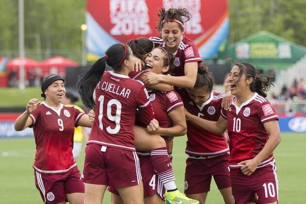 MONCTON, June 9, 2015 -- Players of Mexico celebrate scoring during the group F match against Colombia at the 2015 FIFA Women s World Cup in Moncton, Canada, June 9, 2015. The match ended in a 1-1 draw. ) (SP)CANADA-MONCTON-FIFA WOMEN S WORLD CUP-GROUP F-COLOMBIA VS MEXICO ZouxZheng 