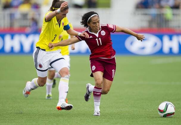 MONCTON, June 9, 2015 -- Natalia Gaitan(L) of Colombia vies with Monica Ocampo(R) of Mexico during their group F match at the 2015 FIFA Women s World Cup in Moncton, Canada, June 9, 2015. The match ended in a 1-1 draw. ) (SP)CANADA-MONCTON-FIFA WOMEN S WORLD CUP-GROUP F-COLOMBIA VS MEXICO ZouxZheng 