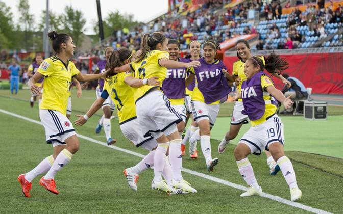 MONCTON, June 9, 2015 -- Players of Colombia celebrate scoring during the group F match against Mexico at the 2015 FIFA Women s World Cup in Moncton, Canada, June 9, 2015. The match ended in a 1-1 draw. ) (SP)CANADA-MONCTON-FIFA WOMEN S WORLD CUP-GROUP F-COLOMBIA VS MEXICO ZouxZheng 