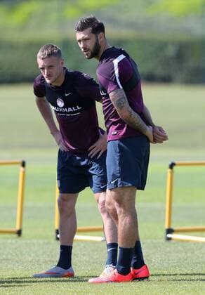England s James Vardy and Charlie Austin during training England Training & press conference PK Pressekonferenz Watford Training Ground - England - 11th June 2015 - Picture David Klein Sportimage EDITORIAL USE ONLY. No use with unauthorised audio, video, data, fixture lists, club league logos or live services. Online in-match use limited to 120 images, no video emulation. No use in betting, games or single club league player publications.