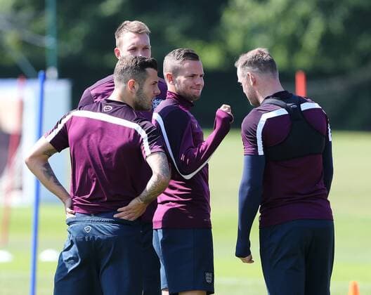England s Tom Cleverley plucks Wayne Rooney s eyebrow during training England Training & press conference PK Pressekonferenz Watford Training Ground - England - 11th June 2015 - Picture David Klein Sportimage EDITORIAL USE ONLY. No use with unauthorised audio, video, data, fixture lists, club league logos or live services. Online in-match use limited to 120 images, no video emulation. No use in betting, games or single club league player publications.