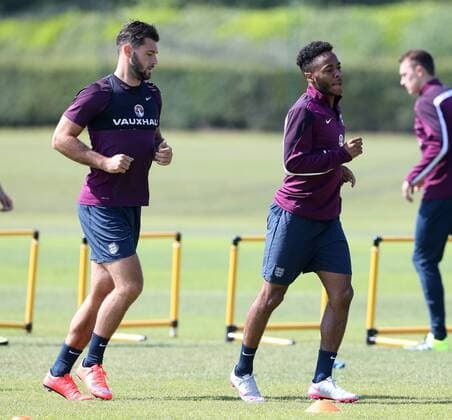 England s Raheem Sterling and Charlie Austin during training England Training & press conference PK Pressekonferenz Watford Training Ground - England - 11th June 2015 - Picture David Klein Sportimage EDITORIAL USE ONLY. No use with unauthorised audio, video, data, fixture lists, club league logos or live services. Online in-match use limited to 120 images, no video emulation. No use in betting, games or single club league player publications.