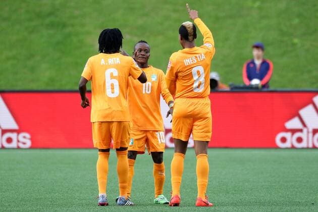 v.li.: Rita Akaffou (CIV), Torschützin Ange Nguessan (CIV) und Ines Nrehy (CIV) bejubeln das 1:0 für die Elfenbeinküste (Ivory Coast, Cote d Ivoire), Jubel, Torjubel, Torerfolg, celebrate the goal, goal, celebration, Jubel ueber das Tor, optimistisch, Action, Aktion, Fussball, FIFA Frauen-WM 2015, Elfenbeinküste - Thailand, xozx