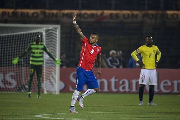 SANTIAGO, June 11, 2015 -- Arturo Vidal (C) of Chile celebrates scoring during the opening match of the Copa America 2015 against Ecuador, in Santiago, capital of Chile, on June 11, 2015. Chile won 1-0. 