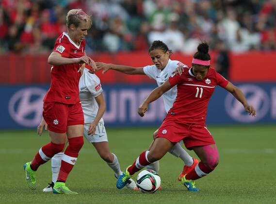 EDMONTON, June 11, 2015 -- Desiree Scott (R)of Canada vies during the Group A match between Canada and New Zealand at Commonwealth Stadium in Edmonton, Canada on June 11, 2015. The match ended with a 0-0 draw. ) (SP)CANADA-EDMONTON-FIFA WOMEN S WORLD CUP-CAN VS NZL QinxLang 