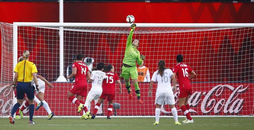 EDMONTON, June 11, 2015 -- Canada s goalkeeper Erin McLeod (Top) saves a goal during the Group A match between Canada and New Zealand at Commonwealth Stadium in Edmonton, Canada on June 11, 2015. The match ended with a 0-0 draw. ) (SP)CANADA-EDMONTON-FIFA WOMEN S WORLD CUP-CAN VS NZL DingxXu 