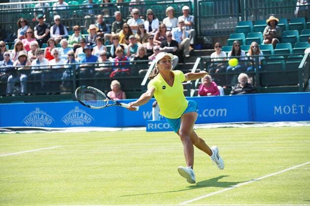 12.06.2015. Nottingham, England. Aegon Open Tennis. Monica Niculescu (Romania) reaches for a volley at the net during her game versus Johanna Konta (GBR xDavidxKissmanx  ActionPlus11630272