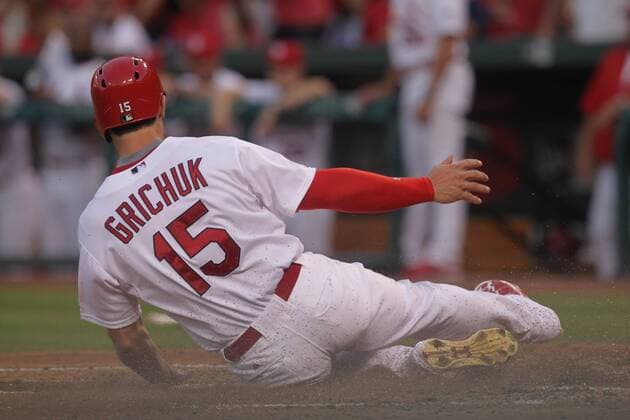 St. Cardinals Randal Grichuk slides safely into home after a triple by Jon Jay in the second inning against the Kansas City Royals at Busch Stadium in St. Louis on June 12, 2015.  SLP2015061203 BILLxGREENBLATT