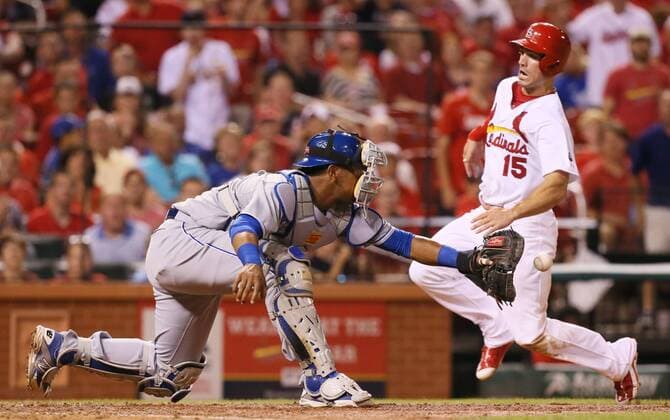 June 12, 2015 - St Louis, MO, USA - The St. Louis Cardinals Randal Grichuk scores on a sacrifice fly past Kansas City Royals catcher Salvador Perez in the eighth inning on Friday, June 12, 2015, at Busch Stadium in St. Louis. The Cards won, 4-0. Kansas City at St. Louis - ZUMAm67_