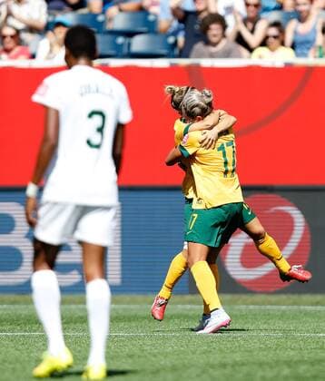 (150612) -- WINNIPEG, June 12, 2015 -- Kyah Simon (R) of Australia celebrates scoring during the Group D match between Australia and Nigeria at Winnipeg Stadium in Winnipeg, Canada on June 12, 2015. ) (SP)CANADA-WINNIPEG-FIFA WOMEN S WORLD CUP-AUS VS NGA WangxLili 