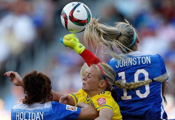 (150613) -- WINNIPEG, June 12, 2015 -- Hope Solo (unseen), goalkeeper of the United States, saves the ball during the Group D match against Sweden at Winnipeg Stadium in Winnipeg, Canada on June 12, 2015. ) (SP)CANADA-WINNIPEG-FIFA-WOMEN S WORLD CUP-USA VS SWE WangxLili 