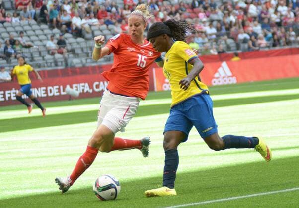 (150613) -- VANCOUVER, June 12, 2015 -- Caroline Abbe (L) of Switzerland vies with Monica Quinteros of Ecuador during the Group C match between Switzerland and Ecuador at the 2015 FIFA Women s World Cup in Vancouver, Canada, on June 12, 2015. Switzerland won 10-1.) (SP)CANADA-VANCOUVER-FIFA-WOMEN S WORLD CUP-SUI VS ECU SergeixBachlakov 