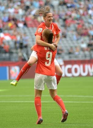 (150613) -- VANCOUVER, June 12, 2015 -- Fabienne Humm (top) of Switzerland celebrates her goal with her teammate Lia Waelti during the Group C match between Switzerland and Ecuador at the 2015 FIFA Women s World Cup in Vancouver, Canada, on June 12, 2015. Switzerland won 10-1.) (SP)CANADA-VANCOUVER-FIFA-WOMEN S WORLD CUP-SUI VS ECU SergeixBachlakov 