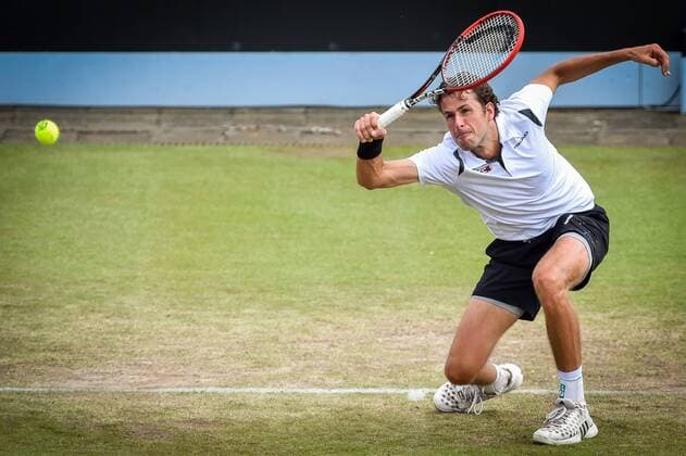 - ROSMALEN, NETHERLANDS: Dutch Robin Haase pictured in action during a tennis game between Dutch Robin Haase and French Nicolas Mahut in the semifinals of the men s tournament at the Topshelf Open WTA Tennis Damen tennis tournament in Rosmalen, the Netherlands, Saturday 13 June 2015. LUCxCLAESSEN  x04642105x