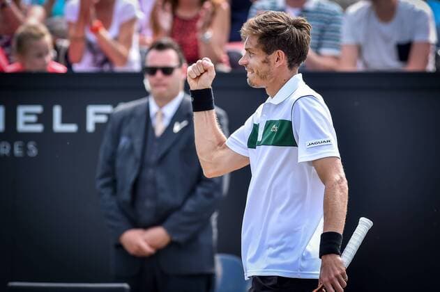 - ROSMALEN, NETHERLANDS: French Nicolas Mahut celebrates after winning a tennis game between Dutch Robin Haase and French Nicolas Mahut in the semifinals of the men s tournament at the Topshelf Open WTA Tennis Damen tennis tournament in Rosmalen, the Netherlands, Saturday 13 June 2015. LUCxCLAESSEN  x04642093x