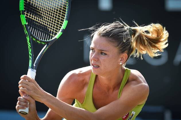 - ROSMALEN, NETHERLANDS: Italian Camila Giorgi pictured in action during a tennis game between Italian Camila Giorgi and Dutch Kiki Bertens in the semifinals of the women s tournament at the Topshelf Open WTA Tennis Damen tennis tournament in Rosmalen, the Netherlands, Saturday 13 June 2015. LUCxCLAESSEN  x04642141x