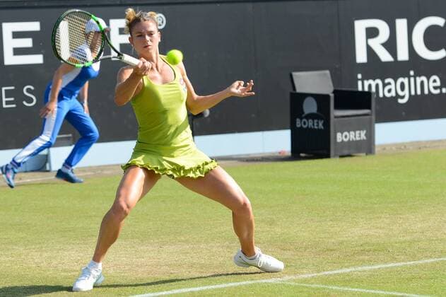 June 13, 2015 - Rosmalen, Holland - CAMILA GIORGI of Italy plays a point in her semifinal match agaist K. Bertens at the Topshelf Open tennis tournament in Rosmalen Holland on Saturday 13 June 2015 Tennis 2015 - Topshelf Open - Day 9 - ZUMAl132