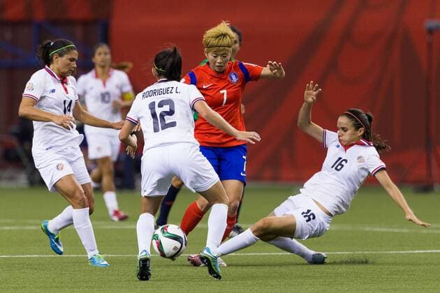 June 13, 2015 : Korea midfielder Jeon Gaeul 7 and Costa Rica midfielder Katherine Alvarado 16 fight for the ball during the 2015 FIFA Women s World Cup Group E match between Korea and Costa Rica at the Olympic Stadium in Montreal, Quebec, Canada. SOCCER: JUN 13 FIFA Women s World Cup - Group E - Korea v Costa Rica Icon15061319 EDITORIAL USE ONLY
