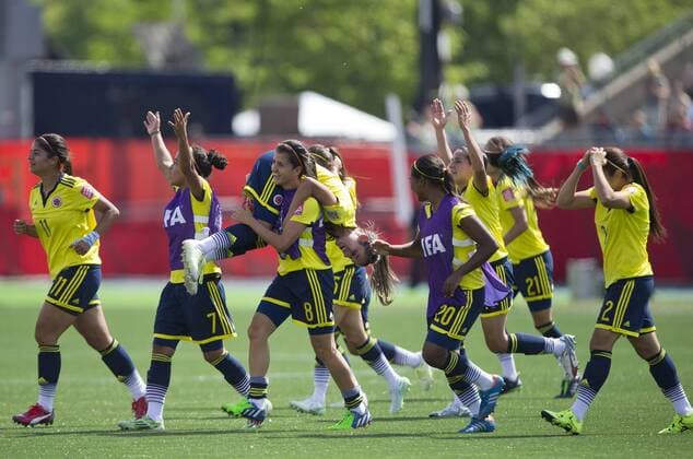 (150613) -- MONCTON, June 13, 2015 -- Players of Colombia celebrate victory after the group F match against France at the 2015 FIFA Women s World Cup in Moncton, Canada, June 13, 2015. Colombia won 2-0. ) (SP)CANADA-MONCTON-FIFA WOMEN S WORLD CUP-GROUP F-FRANCE VS COLOMBIA ZouxZheng 