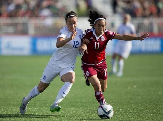 (150614) -- MONCTON, June 14, 2015 -- Lucy Bronze(L) of England vies with Monica Ocampo of Mexico during their group F match at the 2015 FIFA Women s World Cup in Moncton, Canada, June 13, 2015. England won 2-1. ) (SP)CANADA-MONCTON-FIFA WOMEN S WORLD CUP-GROUP F-ENGLAND VS MEXICO ZouxZheng 