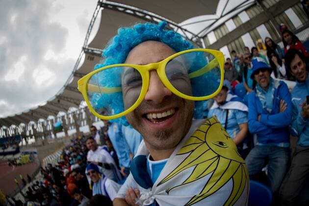 (150614) -- ANTOFAGASTA, June 14, 2015 -- A fan of Uruguay cheers for the team ahead of a Group B match between Uruguay and Jamaica at Copa America 2015 , in Antofagasta, Chile, on June 13, 2015. ) (SP)CHILE-ANTOFAGASTA-COPA AMERICA-GROUP B-URUGUAY VS JAMAICA PedroxMera 