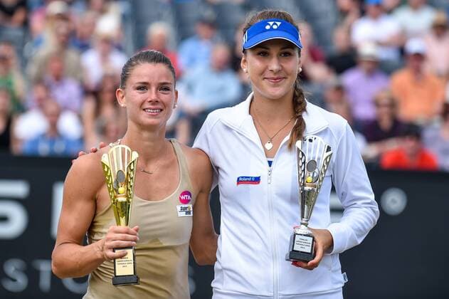 - ROSMALEN, NETHERLANDS: Italian Camila Giorgi and Swiss Belinda Bencic pictured with their trophy after a tennis game between Italian Camila Giorgi and Swiss Belinda Bencic, the finals of the women s tournament at the Topshelf Open WTA Tennis Damen tennis tournament in Rosmalen, the Netherlands, Sunday 14 June 2015. LUCxCLAESSEN  x04642384x