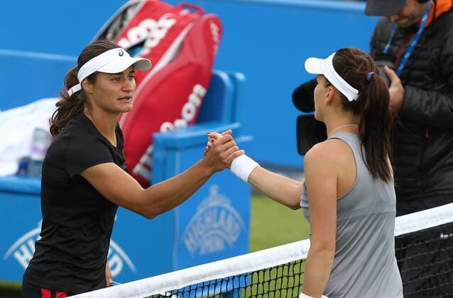 14.06.2015. Nottingham, England. Aegon Open Tennis. Monica Niculescu (Romania) having won the semi final shakes hands with Agnieszka Radwanska (POL) xDavidxKissmanx  ActionPlus11631314