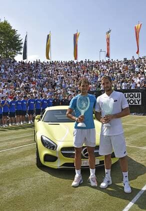 Rafael Nadal (ESP)(links) mit Viktor Troicki (SRB (rechts) gewinnt das erste Rasenturnier in Stuttgart. Jubel Emotion, Freude, vor Siegerfahrzeug Mercedes-AMG GT S mit 510 PS Siegerauto Finale 14.06.2015 Tennis Mercedes-Cup Stuttgart Weißenhof TC Weissenhof Mercedescup Mercedes Cup 06.06..-14.06.2015 Mercedes-Cup Stuttgart Weißenhof 2015