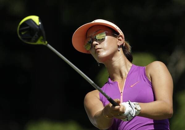 Michelle Wie hits her tee shot on the 12th hole in the final round of the KPMG Women s PGA Golf Herren Championship at Westchester Country Club in Harrison, NY on June 14, 2015.  NYP20150614106 JOHNxANGELILLO
