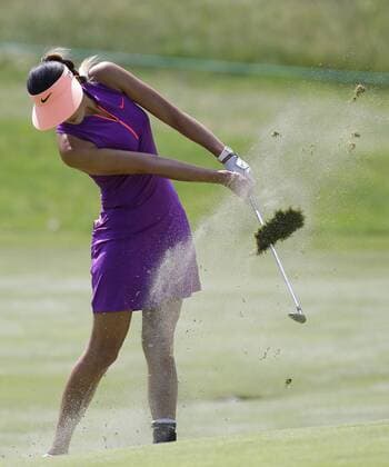 Michelle Wie hits her approach shot on the 10th hole in the final round of the KPMG Women s PGA Golf Herren Championship at Westchester Country Club in Harrison, NY on June 14, 2015.  NYP20150614105 JOHNxANGELILLO
