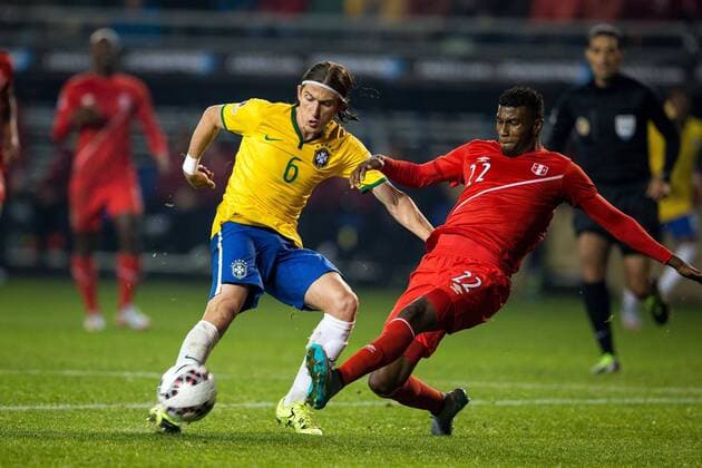 Brazil vs. Peru TEMUCO, AR - 06 14 2015: BRAZIL X PERU - Luis Filipe from Brazil and Peru D. Penny during match between Brazil vs Peru, valid for the first round of the first phase of Group C of the Copa America 2015, held at the Estadio Municipal Germ?n Becker . (Photo: Marcelo Machado de Melo FotoArena)  MarceloxMachadoxdexMelo
