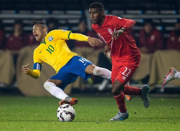 Brazil vs. Peru TEMUCO, AR - 06 14 2015: BRAZIL PERU X - Neymar Jr. Brazil dispute ball C. Ascues Peru during the match between Brazil vs Peru, valid for the first round of the first phase of Group C of the Copa America 2015 held at Stadium Municipal Germ?n Becker. (Photo: Marcelo Machado de Melo FotoArena)  MarceloxMachadoxdexMelo