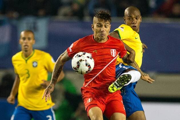 Brazil vs. Peru TEMUCO, AR - 06 14 2015: BRAZIL PERU X - Paolo Guerrero of Peru dispute ball Fernandinho of Brazil during the match between Brazil vs Peru, valid for the first round of the first phase of Group C of the Copa America 2015 held at the Estadio Municipal Germ?n Becker . (Photo: Marcelo Machado de Melo FotoArena)  MarceloxMachadoxdexMelo
