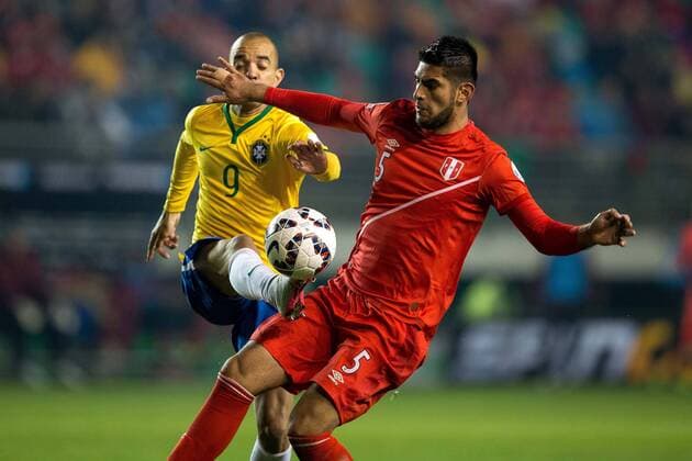Brazil vs. Peru TEMUCO, AR - 06 14 2015: BRAZIL PERU X - Diego Tardelli of Brazil dispute ball C. Zambrano of Peru during the match between Brazil vs Peru, valid for the first round of the first phase of Group C of the Copa America 2015 held at the Municipal Stadium Germ?n Becker. (Photo: Marcelo Machado de Melo FotoArena)  MarceloxMachadoxdexMelo