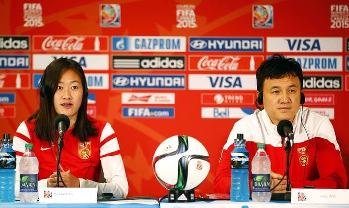 (150615) -- WINNIPEG, June 14, 2015 -- China s head coach Hao Wei (R) and captain Wu Haiyan attend a press conference PK Pressekonferenz in Winnipeg, Canada, on June 14, 2015. China will face New Zealand in the last group A match at the 2015 FIFA Women s World Cup on June 14. ) (SP)CANADA-WINNIPEG-FIFA WOMEN S WORLD CUP-CHINA-PRESS CONFERENCE DingxXu 