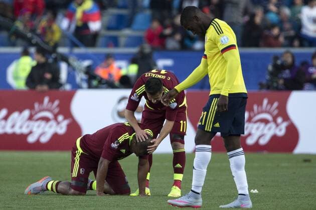 (150615) -- RANCAGUA, June 14, 2015 -- Venezuela s Jose Rondon (L) and Cesar Gonzalez (C) celebrate after winning a Group C match against Colombia at Copa America 2015 in Rancagua, Chile, June 14, 2015. Colombia lost the match 0-1. ) (SP)CHILE-RANCAGUA-COPA AMERICA 2015-GROUP C-COLOMBIA VS VENEZUELA GuillermoxArias 