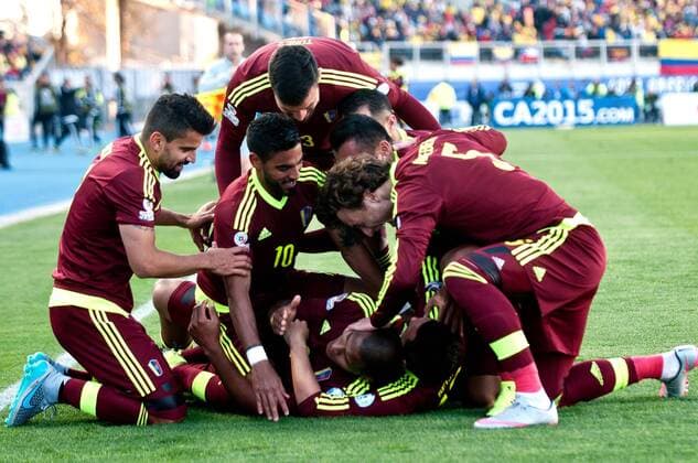(150615) -- RANCAGUA, June 14, 2015 -- Players of Venezuela celebrate scoring during a Group C match between Colombia and Venezuela at Copa America 2015 in Rancagua, Chile, June 14, 2015. Venezuela beat Colombia 1-0.) (SP)CHILE-RANCAGUA-COPA AMERICA 2015-GROUP C-COLOMBIA VS VENEZUELA JorgexVillegas 
